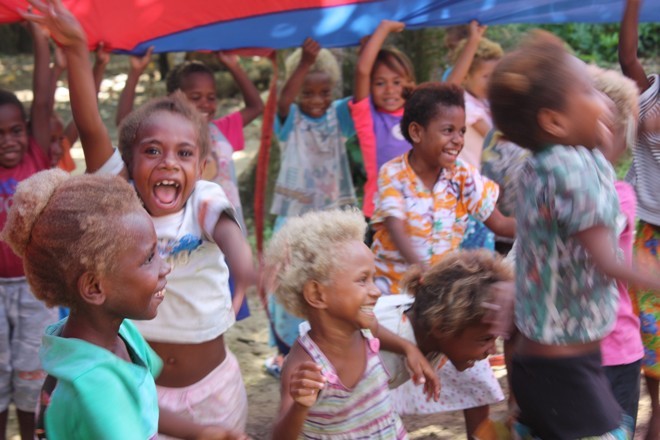 Playing with the Kindy kids with our old spinnaker - Volunteer story © OceanWatch